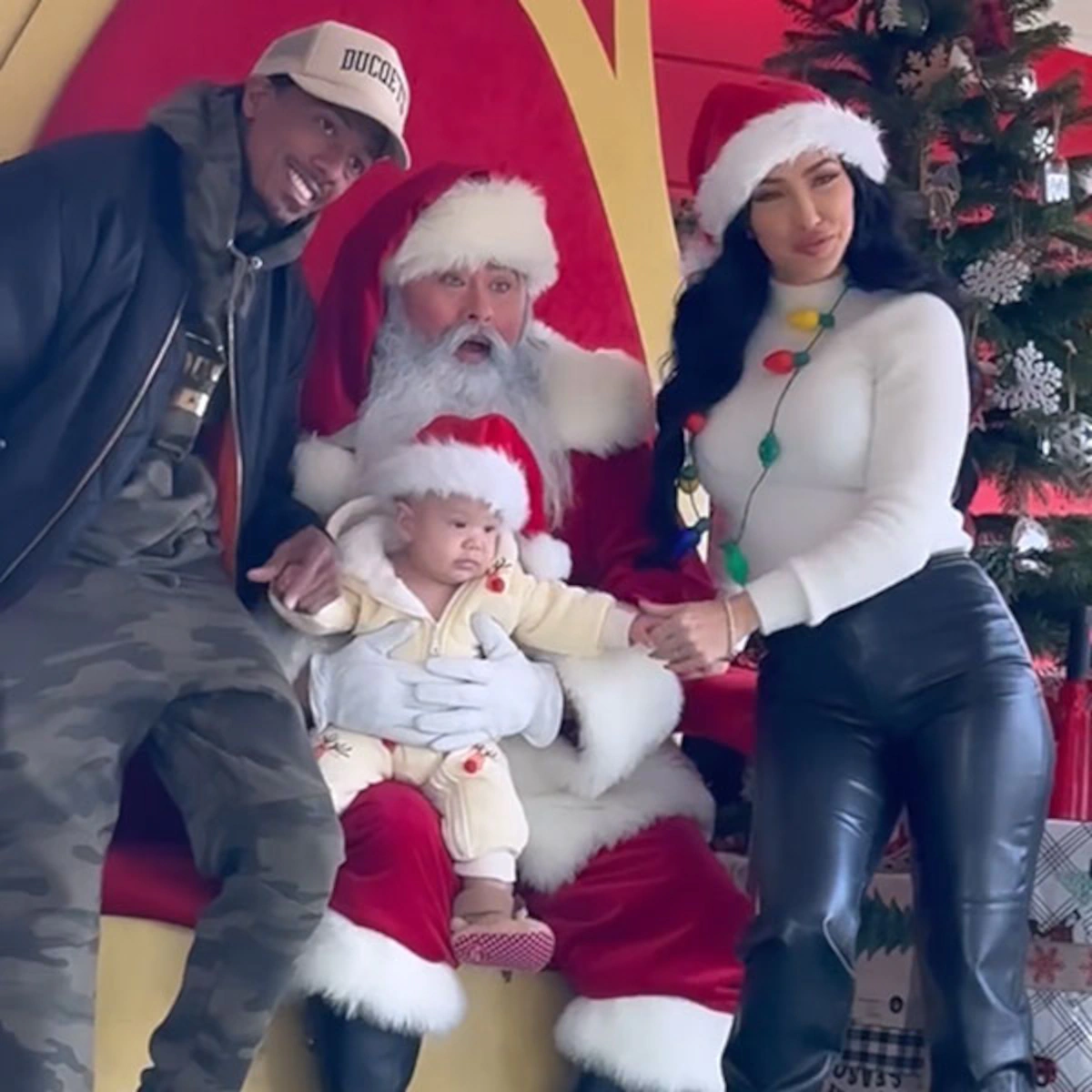 Nick Cannon Poses for Christmas Card